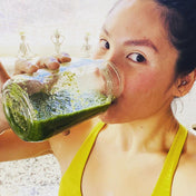 Woman drinking a Super Green smoothie